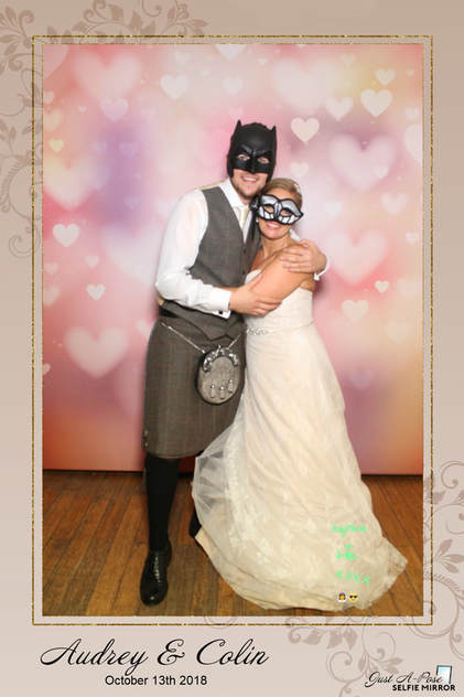 Bride and her groom with masks on